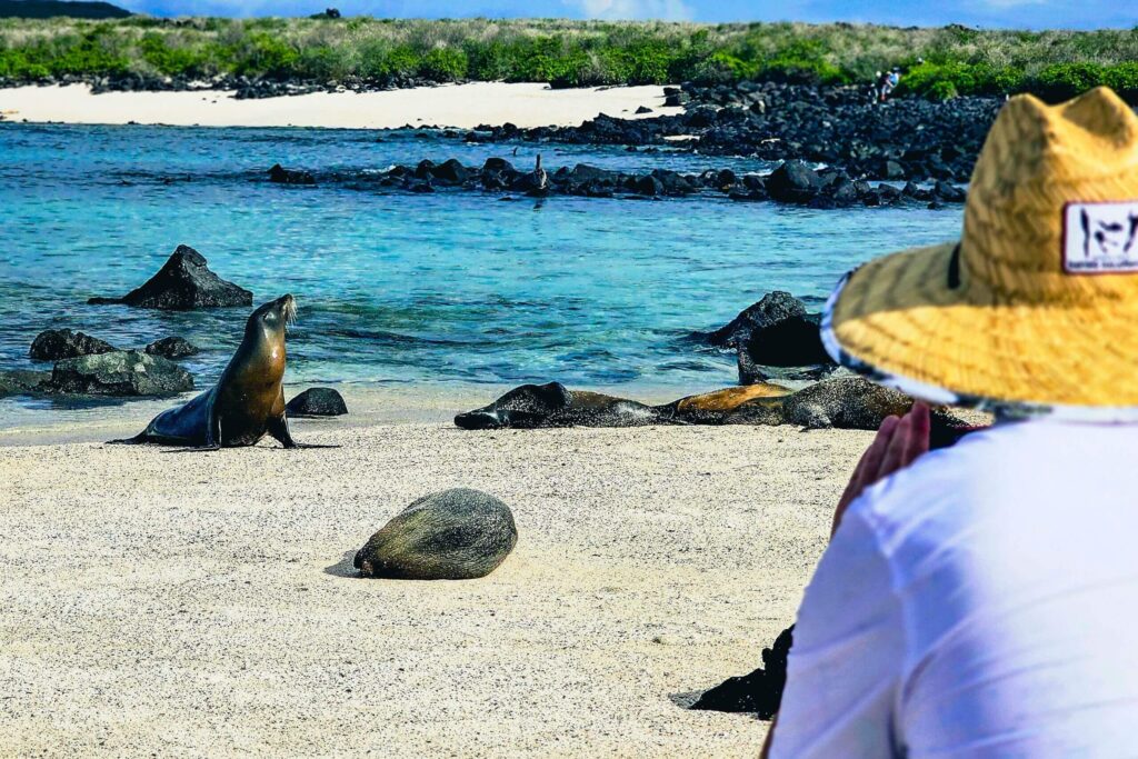 Tourist in Galapagos taking a photo